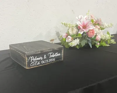 A chalkboard sign welcoming guests to the celebration
